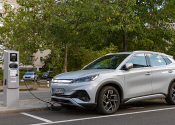 An electric vehicle made by Chinese automaker BYD charges on a street in Germany (iStock image)