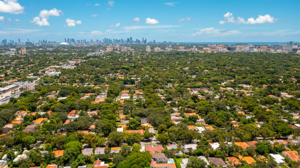 An aerial shot of Coral Gables with the downtown Miami skyline in the background (iStock image)