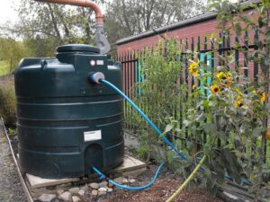 A rainwater collection tank (Penny Mayes, CC BY-SA 2.0, via Wikimedia Commons)