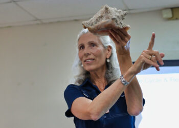 Megan Davis, Ph.D., a research professor at FAU’s Harbor Branch Oceanographic Institute, teaching in the Bahamas. (Photo credit: IsleLens - Tyrie Moss)