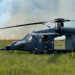 An HH-60 Pave Hawk helicopter at Avon Park Air Force Range with a prescribed fire in the background. The range’s habitats benefit from being able to have prescribed burns, an important tool for maintaining the health of natural landscapes in Florida. (Image courtesy of Avon Air Force Range)