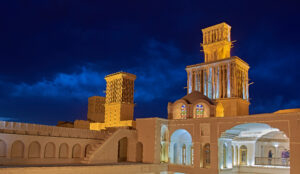 Aghazadeh Mansion, a national historic site in Iran, was built with elaborate wind towers and other natural cooling techniques. (Amir.salehkhah via Wikimedia, CC BY-SA)
