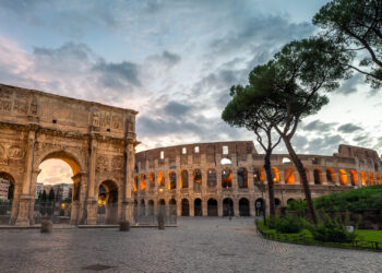 The Arch of Constantine and Colosseum in Rome (iStock image)