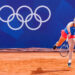 Czech tennis player Karolína Muchová hits a serve at the 2024 Paris Olympics. (Kuberzog, CC BY-SA 4.0, via Wikimedia Commons)