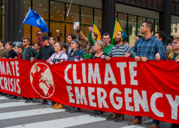 Extinction Rebellion activists protest in Chicago in 2019. (Charles Edward Miller, CC BY-SA 2.0, via Wikimedia Commons)