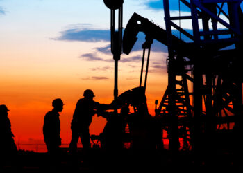 Workers at an oil field (iStock image)