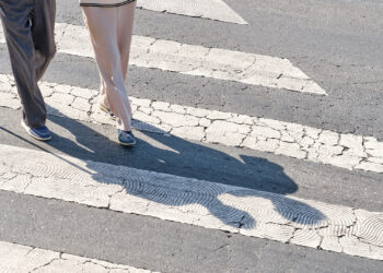 Elderly people crossing a street (iStock image)