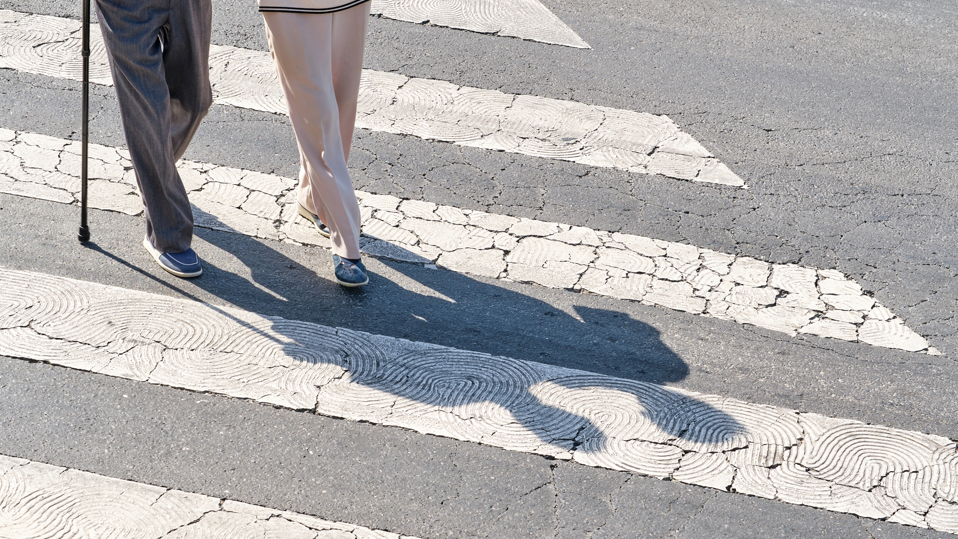 Elderly people crossing a street (iStock image)