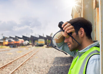 A worker shades himself from the sun. (iStock image)