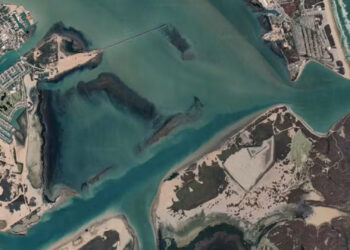 A consequence of dredging deep channels is that water also enters more easily with tides and storm surge. (Google Earth)