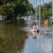 A Tampa street still flooded four days after Hurricane Milton. (Liz Roll/FEMA, via Defense Visual Information Distribution Service)