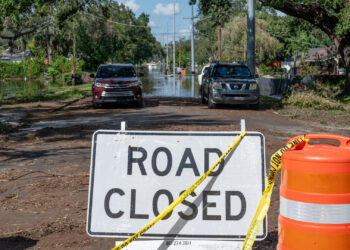 After Hurricane Milton, many streets in Tampa were flooded and closed. This street was still closed four days after the storm. (Liz Roll/Federal Emergency Management Agency, via Defense Visual Information Distribution Service)