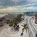 Crews clean up sand scattered throughout Fort Myers Beach during Hurricane Ian and use the sand to build back the beach. (Jocelyn Augustino/FEMA via Defense Visual Information Distribution Service)