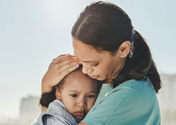 A mother comforts her child (iStock image)