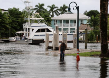 FAU Center for Environmental Studies staff measure water levels in Fort Lauderdale during king tide flooding on Oct. 18. (FAU CES)