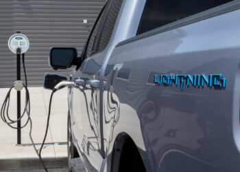 A Ford F-150 Lightning electric truck charging (iStock image)