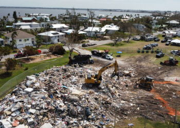 A debris staging area in the aftermath of hurricanes Helene and Milton hitting Florida. (Ubuntwo, CC BY-SA 4.0, via Wikimedia Commons)
