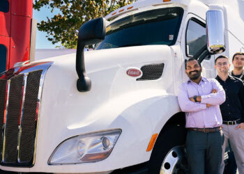 Mechanical and Aerospace Engineering Professor Subith Vasu and students pose with a PACCAR truck that may stand to benefit from Vasu’s hydrogen combustion engine research. (Photo by Antoine Hart)