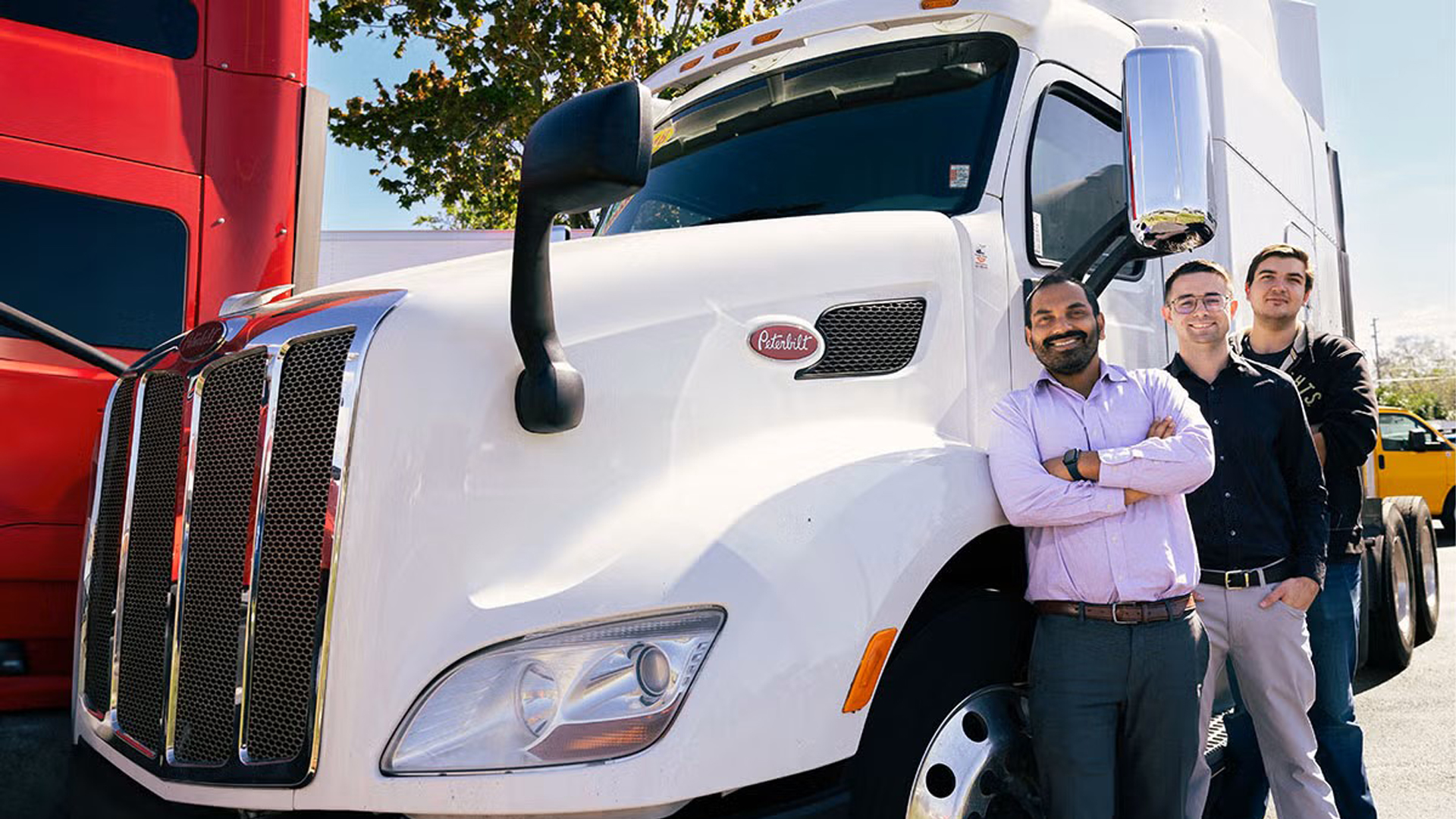 Mechanical and Aerospace Engineering Professor Subith Vasu and students pose with a PACCAR truck that may stand to benefit from Vasu’s hydrogen combustion engine research. (Photo by Antoine Hart)