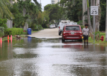 FAU Center for Environmental Studies staff measure water levels in Fort Lauderdale during king tide flooding on Oct. 18. (FAU CES)