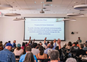 Steven Hofstetter, director of the Alachua County Environmental Protection Department, speaks to a crowd at the Alachua County Climate Summit in November. (Sachi Kitajima Mulkey/Grist)