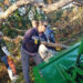 Staff members, including Sarah Mercier (center), help clear away tree limbs downed by Hurricane Helene and Milton. (Florida Museum)