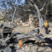 A firefighter observes damage from the Eaton Fire in the Altadena Neighborhood of Los Angeles on Jan. 11, 2025. (Photo by 2nd Lt. Callie McNary/452nd Air Mobility Wing, via Defense Visual Information Distribution Service)