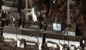 A satellite image of Japan showing damage after an earthquake and tsunami at the Dai Ichi Power Plant. (Digital Globe, CC BY-SA 3.0, via Wikimedia Commons)