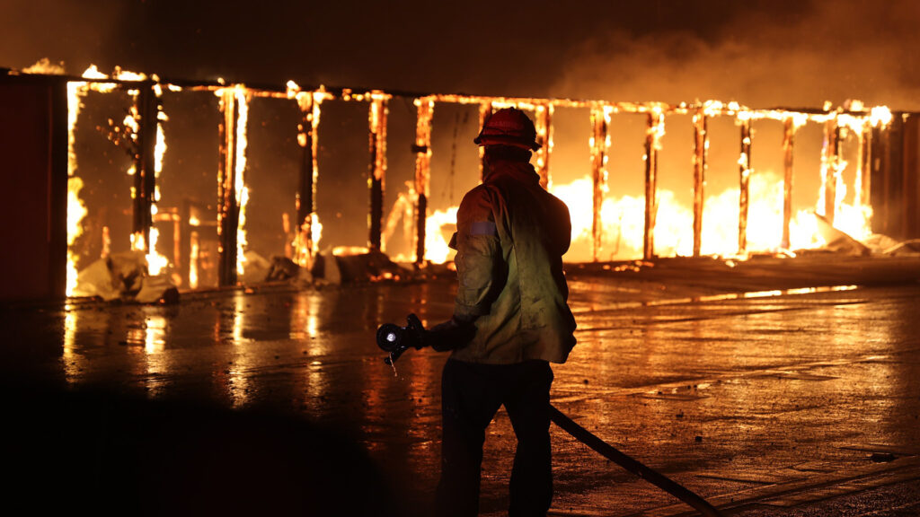 A firefighter at the Palisades Fire in Southern California on Jan. 8 (CAL FIRE, Public domain, via Wikimedia Commons)