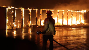 A firefighter at the Palisades Fire in Southern California on Jan. 8 (CAL FIRE, Public domain, via Wikimedia Commons)