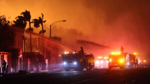 Firefighters battle the Palisades Fire in January 2025 (CAL FIRE, Public domain, via Wikimedia Commons)