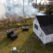 A prescribed fire burns underbrush near a house at the Ordway-Swisher Biological Station in Melrose. (Tyler Jones, UF/IFAS)