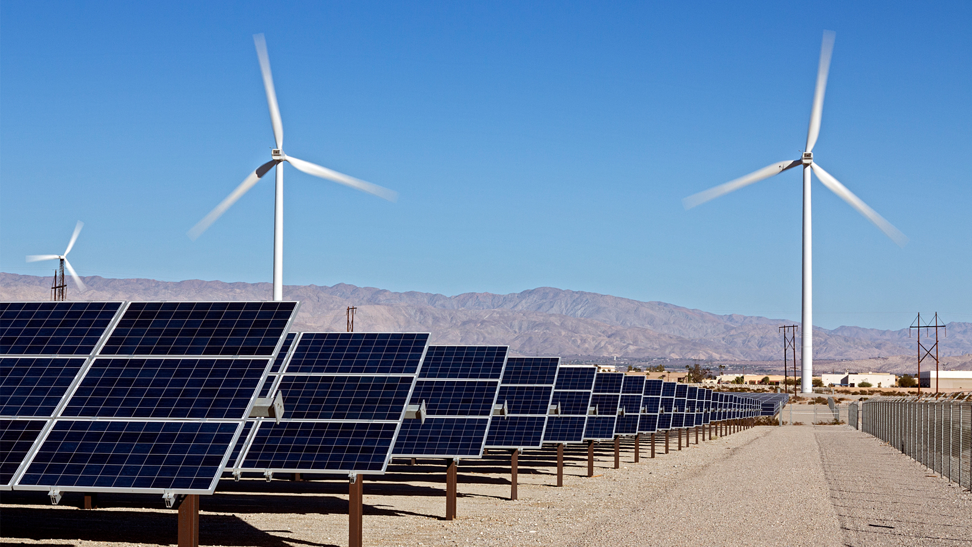 Wind turbines and solar panels in the California desert (iStock image)