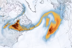 A plume of black carbon particles, commonly called soot, spans eastward from wildfires in Canada and across more than 2,000 miles of the Atlantic Ocean on June 26, 2023. Red and yellow areas denote the densest concentrations of particles. (Credit: NASA Earth Observatory)