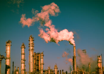Smoke rises from a Gulf Coast oil refinery (iStock image)