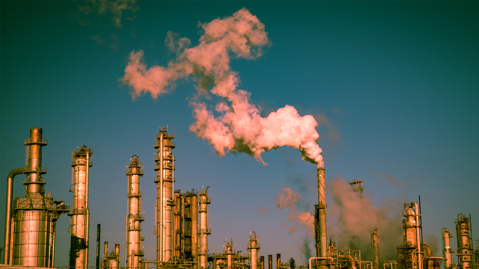 Smoke rises from a Gulf Coast oil refinery (iStock image)