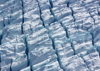 Crevasses in the Jakobshavn Glacier in Greenland have increased in size and depth due to climate change. (NASA ICE, Public domain, via Wikimedia Commons)