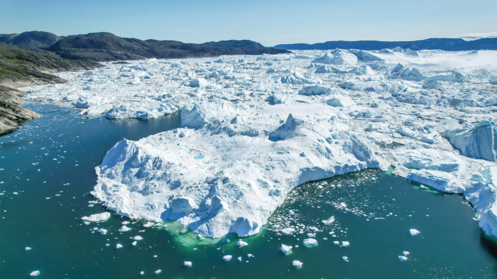 An aerial view of the Jakobshavn Glacier at Disko Bay, Greenland. (Giles Laurent, CC BY-SA 4.0, via Wikimedia Commons)