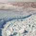 The calving front of the Jakobshavn Glacier in western Greenland, as seen from a NASA aircraft in 2012 (NASA Goddard Space Flight Center, Public domain, via Wikimedia Commons)