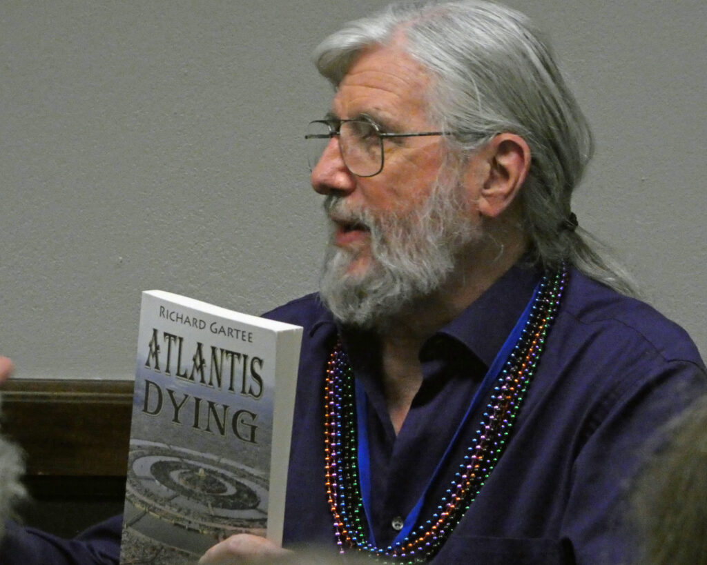 Author Richard Gartee speaks at the “Perspectives of Climate Change in Literature” panel discussion at the Sunshine State Book Festival in Gainesville on Feb. 1. (Chris O'Connor photo)