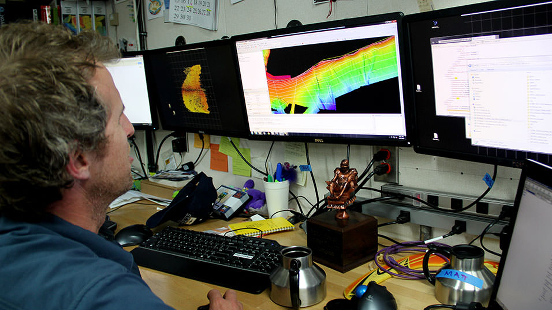 A hydrographer converts sonar data into imagery for NOAA (NOAA's National Ocean Service)