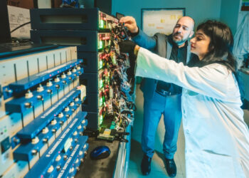Bilal El-Zahab and postdoctoral scientist Aqsa Nazir in the FIU Battery Research Laboratory. (Credit: Margi Rentis/FIU)