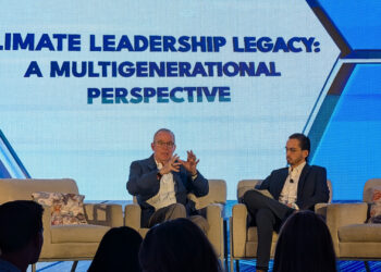 Meteorologist John Morales and his son, John Michael Toohey, take part in a panel titled “Climate Leadership Legacy: A Multigenerational Perspective" during the Climate Correction Conference. (Kimberly Vardeman photo)