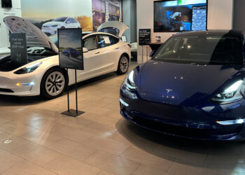 Teslas in a showroom in Miami (Phillip Pessar, CC BY 2.0, via Wikimedia Commons)