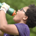 A youth football player hydrating (iStock image)