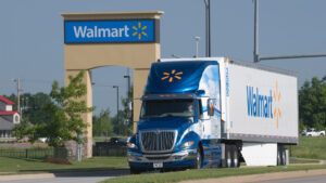 A diesel-electric hybrid Walmart truck, Walmart eliminated 1 billion tons of carbon emissions from its supply chain in less than seven years. (Walmart, CC BY 2.0, via Wikimedia Commons)