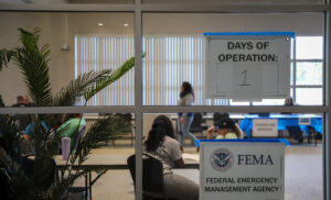Federal Emergency Management Agency (FEMA) employees assist Hurricane Milton survivors with registering and applying for FEMA aid at a Disaster Recovery Center in Indian River County. (Photo by Chief Petty Officer Daniel M. Young/FEMA, via Defense Visual Information Distribution Service)