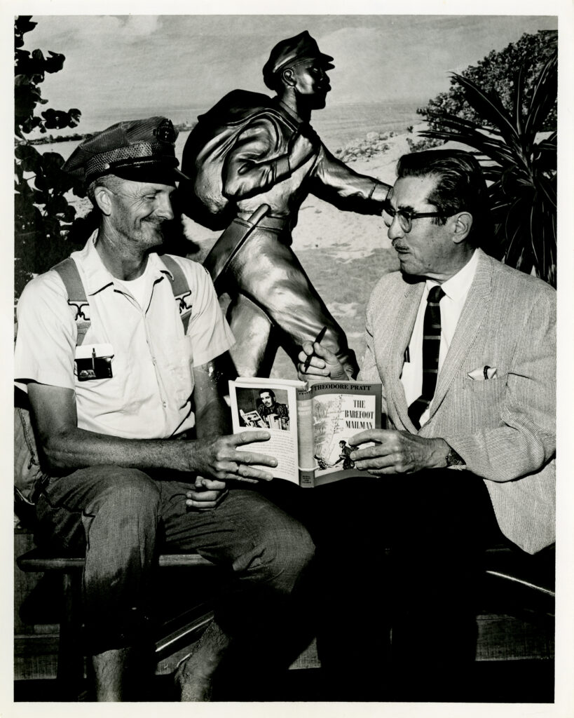 Theodore Pratt with one of the real-life barefoot mailmen and a couple of his book (FAU Special Collections)