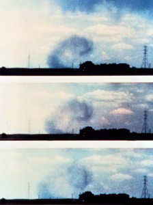 Dust in the air shows the curling rotation of a downburst’s winds. (NOAA)