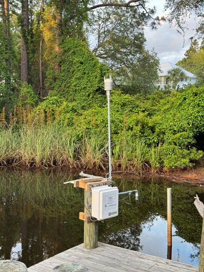 A weather and water level station in a canal in Florida. (FAU)